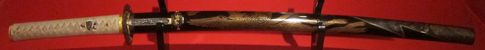 Wakizashi (short sword) mounting inlaid with phoenixes, Kamakura period
