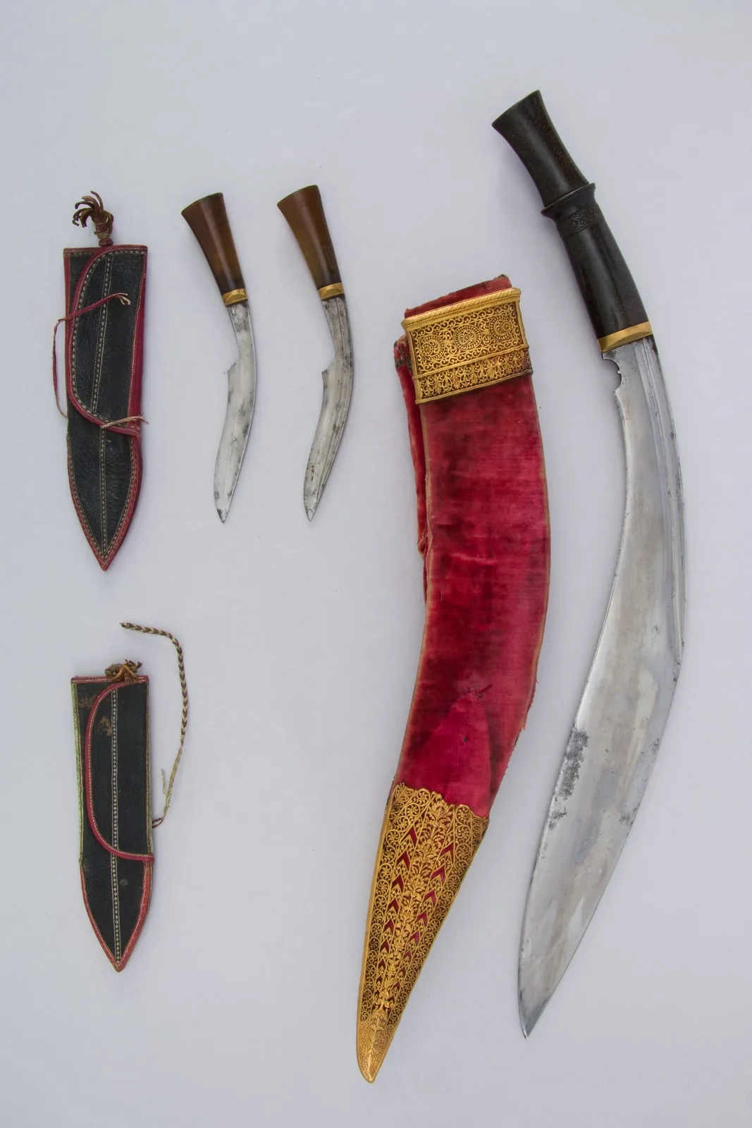 Knife (Kukri) with Two Sheaths, Two Small Knives, and Two Sharpening Pouches